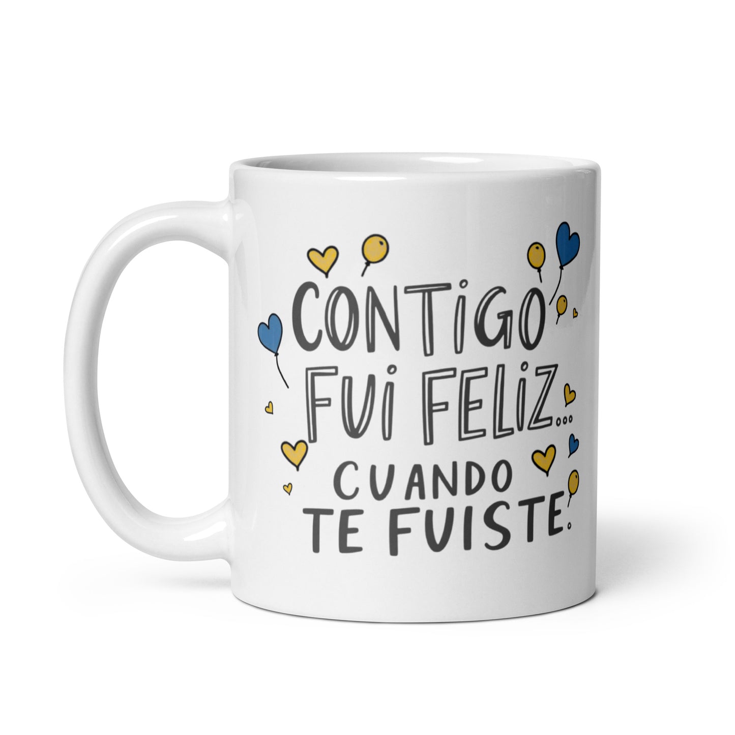 Taza con frase “Contigo fui feliz...cuando te fuiste” para desamor irónico