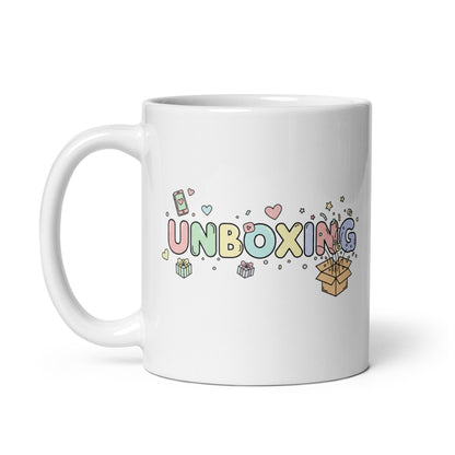 Taza con frase “Unboxing” para influencers que hacen contenido de apertura